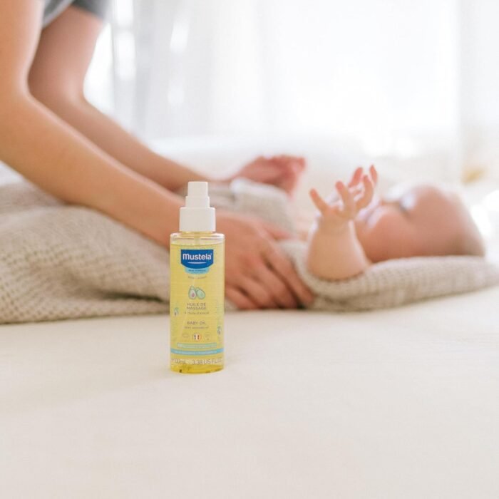 Mustela Baby Oil - Moisturizing Oil for Massage - with Natural Avocado, Pomegranate & Sunflower Oil - 3.38 fl. Oz - Image 5